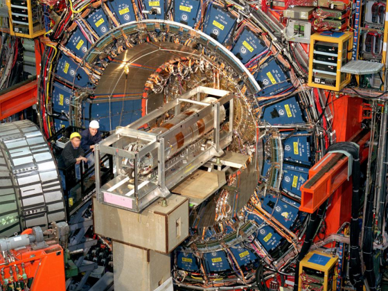 Key Particle Weighs in a Bit Heavy, Confounding Physicists