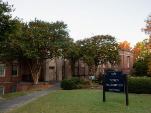 View of the Physics building, with emphasis on the plaque saying "Physics and Mathematics" 