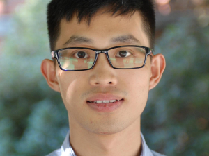 headshot of Son Nguyen, asian man with black hair and black glasses