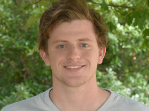 headshot of Andrew Smith, blond man with blue eyes and short hair.